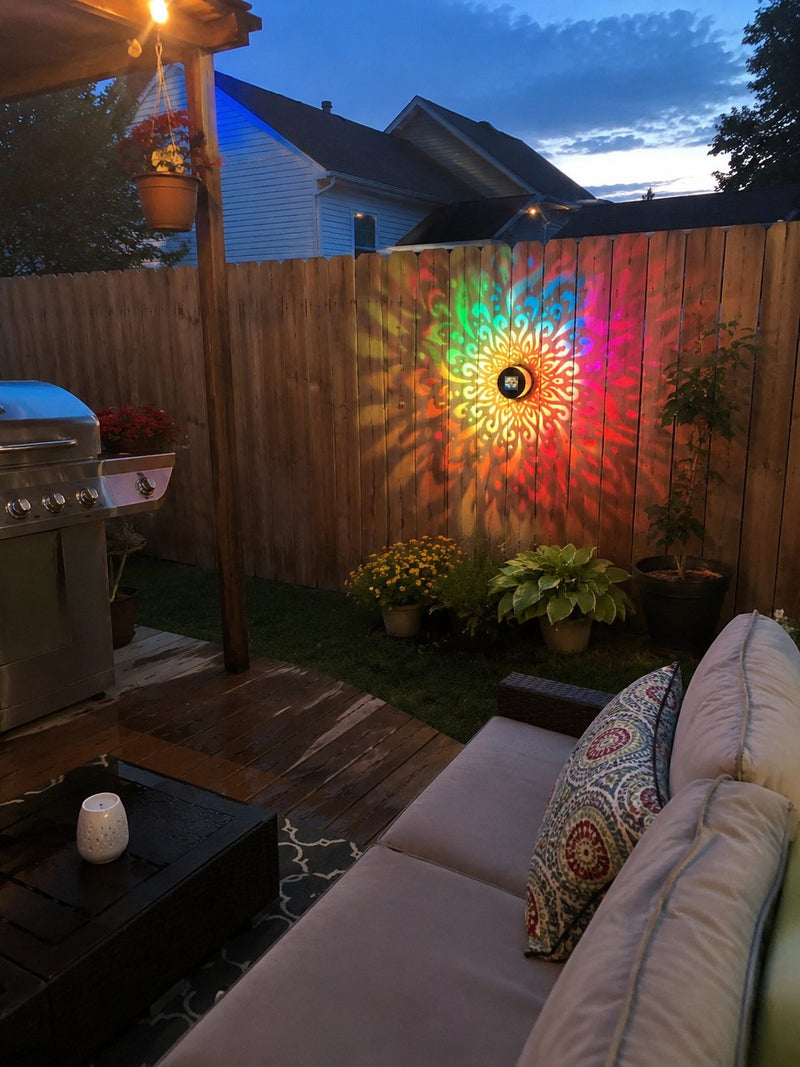 MandalaGlow on backyard fence